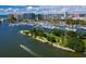 High angle shot of a marina surrounded by downtown city buildings and blue ocean at 100 Central Ave # C619, Sarasota, FL 34236