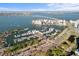 Aerial view of marina and condos in a coastal community near the ocean at 100 Central Ave # C619, Sarasota, FL 34236