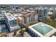 An aerial view of condos in an urban area with plenty of parking spaces at 100 Central Ave # C619, Sarasota, FL 34236