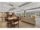 Spacious clubhouse with a wet bar, multiple seating areas, and access to an outdoor terrace at 100 Central Ave # C619, Sarasota, FL 34236