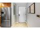 Inviting entryway with modern tile flooring and stainless steel appliances at 100 Central Ave # C619, Sarasota, FL 34236