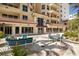 This building features comfortable seating, and a view of the interior through glass doors at 100 Central Ave # C619, Sarasota, FL 34236