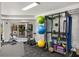 Bright gym featuring exercise equipment, natural light, and a variety of fitness accessories at 100 Central Ave # C619, Sarasota, FL 34236