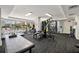 Well-equipped gym with treadmills, weight machines, and floor-to-ceiling windows at 100 Central Ave # C619, Sarasota, FL 34236