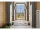 Bright lobby featuring a large window, tile flooring, neutral walls, and comfortable seating at 100 Central Ave # C619, Sarasota, FL 34236