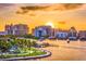 A sunset view of waterfront condos and a public park with walking path at 100 Central Ave # C619, Sarasota, FL 34236