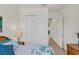 Bright bedroom featuring a closet, neutral walls, and lovely décor at 10412 Crooked Creek Dr, Venice, FL 34293