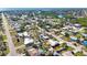 Aerial view showcases this neighborhood by the water and other waterfront properties at 1075 Falcon Rd, Venice, FL 34293