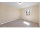 Bedroom features wood-look floors, overhead lighting, and a window at 1075 Falcon Rd, Venice, FL 34293