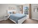 Bedroom with coastal decor and a view from the window at 1087 Piedmont Rd, Venice, FL 34293