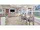 Spacious open-concept dining area connects to the kitchen and living room, creating an inviting space at 1087 Piedmont Rd, Venice, FL 34293