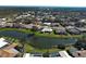 Picturesque waterfront property nestled on a tranquil lake, offering stunning views and a serene atmosphere at 1125 Deardon Dr, Venice, FL 34292