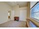Bedroom with lots of space, a closet, and a window, creating a bright atmosphere at 1125 Deardon Dr, Venice, FL 34292