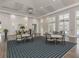 Spacious room with tables, chairs, plants and great natural light, in a community clubhouse at 11575 Okaloosa Dr, Venice, FL 34293