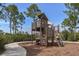 Wooden playground with climbing structures and slides at 11575 Okaloosa Dr, Venice, FL 34293