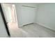 A light and airy bedroom with a closet at 12390 Talavera St, North Port, FL 34287