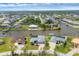 Waterfront homes nestled along picturesque canals in a lush community, featuring private docks and pools at 15688 Melport Cir, Port Charlotte, FL 33981