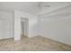 Bedroom with tile flooring, a window, and an open entry, creating a bright and spacious feel at 15688 Melport Cir, Port Charlotte, FL 33981