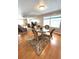 Charming dining area with a glass-top table and comfortable seating for four at 16 Nautical Dr, North Port, FL 34287