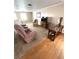 Cozy living room with comfortable seating and a stylish entertainment center at 16 Nautical Dr, North Port, FL 34287
