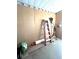 Spacious storage room with a ladder and gardening equipment for a functional and organized space at 16 Nautical Dr, North Port, FL 34287