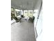 Bright and airy sunroom with lots of natural light and comfortable seating, perfect for relaxation at 16 Nautical Dr, North Port, FL 34287