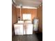Utility room with washer, dryer, and water heater at 16 Nautical Dr, North Port, FL 34287
