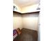 Walk-in closet with shelving, rod for hanging clothes, and carpeted floor at 16 Nautical Dr, North Port, FL 34287