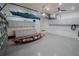 Finished garage with epoxy floors, storage cabinets, and room for kayaks at 177 Ingram Blvd, Rotonda West, FL 33947