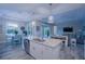 Spacious kitchen island with granite countertop and stainless steel dishwasher, ideal for entertaining at 177 Ingram Blvd, Rotonda West, FL 33947
