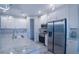 Bright, modern kitchen with stainless steel appliances, granite countertops, and custom cabinets at 177 Ingram Blvd, Rotonda West, FL 33947