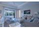 Cozy living room featuring comfortable seating, a TV, and a sliding glass door to the patio at 177 Ingram Blvd, Rotonda West, FL 33947
