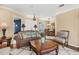 Comfortable living room flows seamlessly into the dining area, perfect for entertaining at 1995 White Feather Ln, Nokomis, FL 34275
