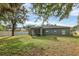 Backyard with grass and trees at 2038 Mincey Ter, North Port, FL 34286
