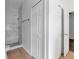 Bathroom features marble tile shower and brown tile floor at 2038 Mincey Ter, North Port, FL 34286