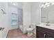 Bathroom with a shower and dark brown vanity at 2038 Mincey Ter, North Port, FL 34286