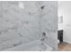 Bathroom with a full tub and shower at 2038 Mincey Ter, North Port, FL 34286