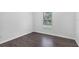 Bedroom with wood-look floors and lots of natural light at 2038 Mincey Ter, North Port, FL 34286