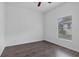 Bedroom with wood-look floors and natural light at 2038 Mincey Ter, North Port, FL 34286