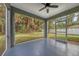 Screened-in porch overlooking backyard at 2038 Mincey Ter, North Port, FL 34286