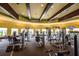 Spacious fitness center with state-of-the-art exercise equipment and plenty of natural light at 20806 Valprato Ct, Venice, FL 34293