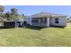 Spacious backyard featuring a newly installed above ground pool, and view of the lanai at 2450 Sahara Ln, North Port, FL 34286