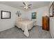 Comfortable bedroom with a neutral color palette and window with natural light at 2450 Sahara Ln, North Port, FL 34286