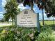 Welcome to Butler Park sign in Morgan Gathering Community Center with flowers and blue skies at 2450 Sahara Ln, North Port, FL 34286