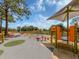 Community playground features interactive play equipment and plenty of room to climb and play at 2450 Sahara Ln, North Port, FL 34286