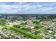 Community aerial view featuring a canal running through the neighborhood at 2694 Hopwood Rd, North Port, FL 34287