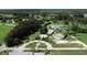 Community with large pond area, surrounded by beautiful trees at 2694 Hopwood Rd, North Port, FL 34287
