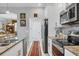 Modern kitchen features granite countertops and stainless steel appliances at 2694 Hopwood Rd, North Port, FL 34287