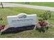 Warm Mineral Springs Park sign with natural wellness experience message and address at 2694 Hopwood Rd, North Port, FL 34287