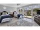 Bedroom boasts an inviting space with tiled floors and large windows at 325 Fiesole St, Venice, FL 34285